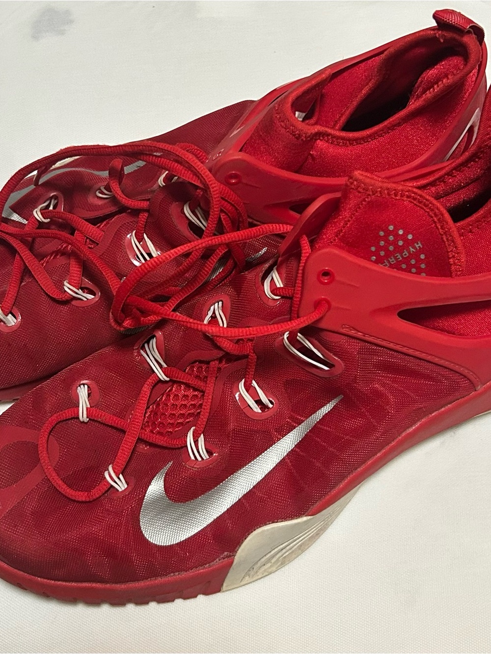 Nike Red Athletic Shoes with Silver Swoosh